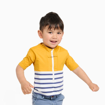 Floatee anti-drowning T-shirt for children, worn by male toddler/kid, yellow at the top and striped jersey at the bottom, short sleeves